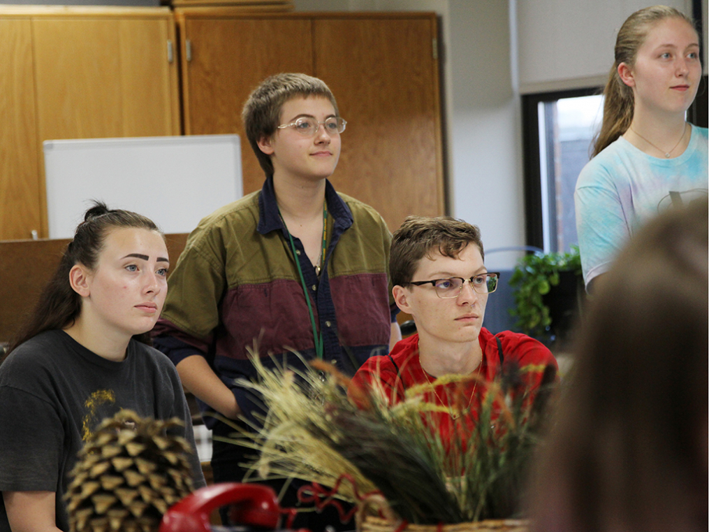 Art students look on as the new Center for Art & Design is opened. 